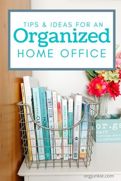 an organized home office with flowers and books