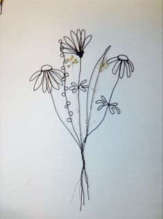 a drawing of some flowers on a white background