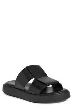 Indulge in the comfort of smooth leather with this wide-strap slide sandal set atop a thick platform sole. Cushioned footbed Leather upper and lining/synthetic sole Imported Modern Leather Footbed Slide Sandals, Modern Platform Slippers With Leather Footbed For Beach, Modern Leather Slides With Textured Footbed, Modern Leather Slide Footbed Sandals, Modern Slides With Leather Footbed, Casual Leather Platform Slides, Modern Synthetic Slide Footbed Sandals, Modern Leather Platform Footbed Sandals, Slides For Men