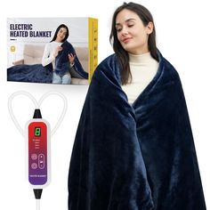 the electric heated blanket is in front of a book and an electric heating blanket next to it