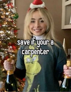 a woman holding two bottles of champagne in front of a christmas tree with the caption save if your a carpenter