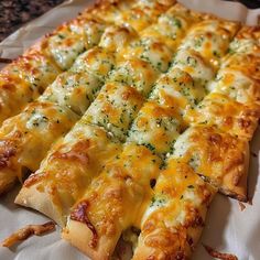 a cheesy pizza cut into eight slices