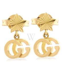 Gucci Ladies Earrings. SKU: YBD648604001. Color: Yellow. Metal Type: Yellow Gold. Metal Stamp: 18k. Gem stone type: None. Earrings style: 1 Band. Gucci GG Running 18k earrings. Versace Watch, Fine Pens, Gold Models, Fragrance Gift, Cheap Gifts, Denim Shoes, Fragrance Gift Set, Crossbody Messenger Bag, Gem Stone