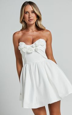 Angeletta Mini Dress - Sweetheart Rosette Detail Fit & Flare in White | Showpo White Coquette Corset Dress With Sweetheart Neckline, Flirty White Mini Dress With Boned Bodice, White Coquette Mini Length Dress, White Flirty Mini Dress With Boned Bodice, White Coquette Corset Dress With Fitted Bodice, Spring Mini Dress With Heart-shaped Neckline And Lined Bodice, Coquette Mini Dress With Sweetheart Neckline For Wedding, Flirty White Corset Dress With Boned Bodice, Flirty Mini Dress With Sweetheart Neckline