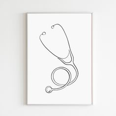 a black and white drawing of a medical stethoscope on a paper sheet