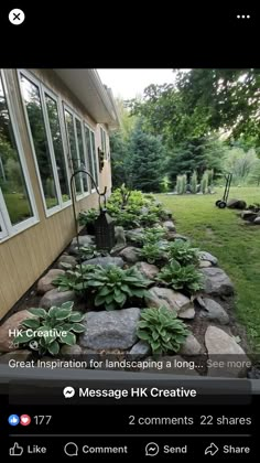 an image of a house with landscaping in the front yard and back yard area,