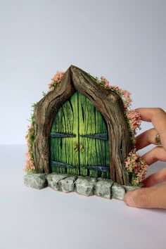 Styrofoam green fairy door with flower, stone and woood Faerie Door Diy, Polymer Clay Fairy Door Tutorial, How To Make A Fairy Door, Polymer Clay Fairy Doors, Fairy Doors Diy, Clay Fairy Doors, Fairy Door Ideas, Clay Fairy Door, Enchanted Forest Book