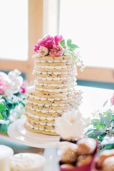 a wedding cake made out of cookies and flowers