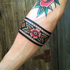 a person with a tattoo on their arm