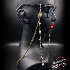 Handmade piece. One of a kind. chain for your eyeglasses or sunglasses. Featuring large glass pearls surrounded with coiled rhinestones connector, peacock pearls, rhinestones and antique style pendants. Metal Beaded Glasses Chains For Party, Beaded Metal Glasses Chains For Party, Elegant Metal Glasses Chains For Parties, Elegant Metal Glasses Chains As Fashion Accessory, Elegant Metal Beaded Glasses Chain, Elegant Pearl Chain Jewelry For Festivals, Elegant Glass Jewelry With Pearl Chain, Handmade Elegant Glasses Chains For Festivals, Elegant Handmade Glasses Chains For Festivals