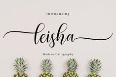 three pineapples with the word leisha written in cursive font