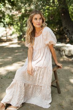 Embrace effortless comfort with our Maddie Dress, featuring a playful gingham print and a roomy, flowy fit that flatters every body type. The super stretchy neckline, perfect for nursing moms, allows for versatile styling, while the fully lined design ensures confidence and comfort. Perfect for any occasion, from sunny picnics to casual outings, this dress effortlessly combines vintage appeal with modern ease. Available in sizes XS to XXL, it's your go-to choice for chic, carefree style.Montecito CollectionFITEasy Roomy FitStretchy NecklineMaternity + Nursing FriendlyLinedX-SMALLSMALLMEDIUMLARGEX-LARGEXX-LARGE51" Long52" Long 53" Long54" Long  55" Long56" Long16" Wide17" Wide18" Wide19" Wide20" Wide21" WideFor more sizing information, please click HEREPAIRED WITH:MATERIAL + CARE50% Rayon50 Modest Boho Dresses, Feminine Modest Dresses, Mom And Me Dresses, Natural Fiber Clothing For Women, Winter Picnic Outfit, Flowy Vintage Dress, Church Outfit Fall Sunday, Modest Maternity Outfits, Homestead Dress