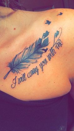 a woman with a tattoo on her shoulder that says i will carry you with me