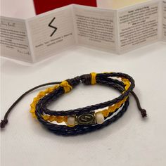 Immerse Yourself In The Ancient World Of The Vikings With Our Unique, Handcrafted Bracelet Adorned With Viking Runes. Each Piece Is A Work Of Art, Meticulously Crafted By Hand, Combining Threads, Leather, Wood, And More To Create A Stunning Accessory That Tells A Story. *Unique Pieces:* No Two Bracelets Are Alike, Making Each One Truly Special. *Handmade:* Expertly Crafted By Artisans Using Traditional Techniques. *Material Fusion:* A Beautiful Blend Of Threads, Leather, Wood, And Other Natural Viking Rune Bracelet, Rune Bracelets, Layered Cross Necklace, Hanging Necklaces, Black Wedding Rings, Vintage Dragon, Wood Bracelet, Leather Corded Necklace, Viking Runes