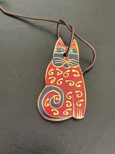 Vintage Laurel Burch painted wood cat pendant or ornament Measures 1.5" X 2.75" Excellent condition See pictures for additional details Laurel Burch Cats, Wood Cat, Cat Pendant, Laurel Burch, Cat Pendants, Wood Pendant, San Rafael, Size 10 Rings, Painted Wood