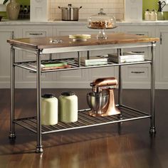 a kitchen island with an open shelf in the middle