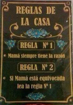 a sign that says reglas de la casa, regla no 1 and regla no 2