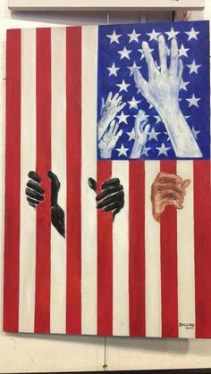 an american flag with two hands reaching out to each other over the top of it