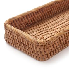 an empty wicker tray on a white background