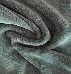 a close up view of the fabric on a bed sheet that has been made to look like