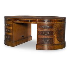 an antique wooden desk with drawers on it