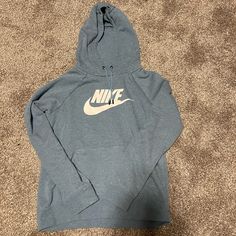 Womens Nike Hoodie. Size Small. Light Blue Color. Almost Brand New! Worn Only A Couple Times. Lacrosse Hoodie, Grey Nike Hoodie, Heritage Logo, Navy Hoodie, Womens Nike, Grey Nikes, Blue Hoodie, Nike Hoodie, Small Light