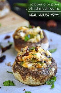 baked stuffed mushrooms with cheese and toppings on the top are ready to be eaten