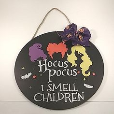 a sign that says hogs pocus i smell children