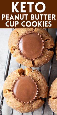 keto peanut butter cupcakes on a cooling rack with chocolate in the middle