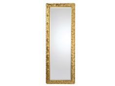 a gold framed mirror on a white wall