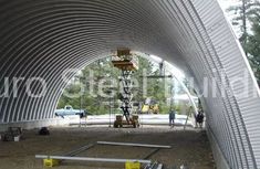 the inside of a large metal structure under construction