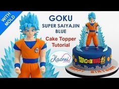 a cake that is decorated to look like goku and the dragon ball character on top