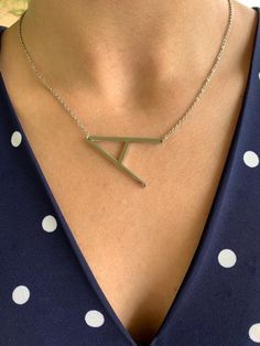 "Large Initial Necklace, Big Letter Necklace, Sideways Initial Necklace, Oversized Initial Necklace, Alphabet Necklace, Stainless Steel, Stainless Steel Initial Letter Necklace Gold Plated This beautiful Stainless Steel necklace can be worn on its own or as a layering piece. It will add statement to your outfit. It comes available in gold and silver color. It does not fade or tarnish. Excellent quality*. ♦ Materials: Stainless Steel ♦ Available colors: Gold and Silver ♦ Necklace measurements: 14 Nickel Free Initial Pendant Necklace, Unbiological Sister Necklace, Gold And Silver Necklace, Delicate Layered Necklace, Letter Necklace Gold, Silver Heart Jewelry, Poppy Necklace, Initial Letter Necklace, Necklace Measurements