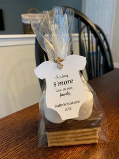 a bag of cookies sitting on top of a wooden table