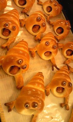 there are many hotdogs with googly eyes on them