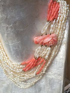 Art nouveau long necklace rose carved coral with rice pearls and rice coral beads in 14k gold circa 1900's. The total length is 33 inches.This is such a beautiful necklace could be a nice bridal necklace for either the mother of the bride or groom. Well carved coral accent in the middle of the necklace. Such a timeless piece of jewelry in perfect shape despite the age. Art Nouveau Rose, Conch Pearl, Festoon Necklace, Rice Pearls, Sea Star, Coral Jewelry, Necklace Rose, Handmade Beaded Jewelry, Beaded Jewelry Patterns