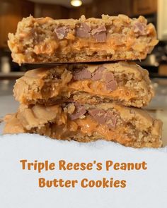 triple reese's peanut butter cookies stacked on top of each other