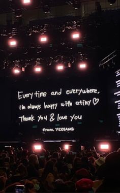 an audience at a concert with the words every time and everywhere, i'm always happy with atmv thank you & love you