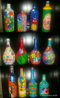 many different colored bottles are sitting on a shelf