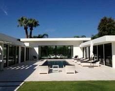 an empty swimming pool in the middle of a house