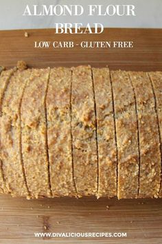 a loaf of bread sitting on top of a wooden cutting board with the words almond flour bread