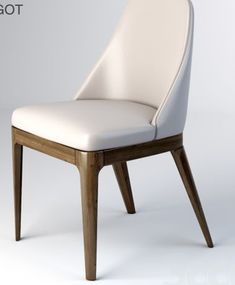 a white chair sitting on top of a wooden table