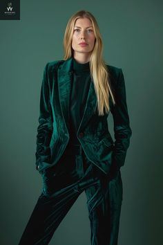 Elevate your wedding or office attire with the opulent charm of a green velvet two-piece suit designed for the modern woman. This ensemble seamlessly merges luxury and professionalism, featuring a blazer and trousers crafted from sumptuous green velvet fabric. The blazer steals the spotlight with its peaked lapels, a bold and stylish choice that exudes confidence and sophistication. The peaked lapels, with their upward-pointing edges, add a touch of drama to the ensemble, creating a commanding p Green Velvet Suit For Women, Suit Women Wedding, Satin Suit Women, Business Suit Women, Green Velvet Suit, Women Pant Suit, Turquoise Suit, Wedding Guest Outfit Fall, Satin Suit