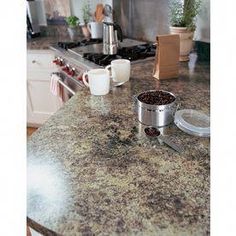 a kitchen counter top with coffee cups on it