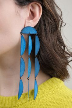 These stunning Rain Blue Earrings are carefully crafted by hand for a lightweight and comfortable fit. Their unique beautiful blue color adds a special touch to any outfit. Earrings Shapes, Moma Shoes, Annie Costello Brown, Rain Blue, Patina Earrings, Farmhouse Pottery, Tassel Scarf, Rachel Comey, Bar Accessories