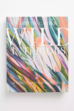 the book cover is colorfully painted with white lettering