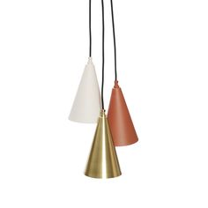 three different colored lamps hanging from the ceiling