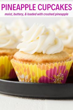 two cupcakes with white frosting on top and the title overlay reads pineapple cupcakes