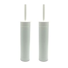 two white candles are in the shape of cylinders