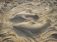 the sand is made to look like waves